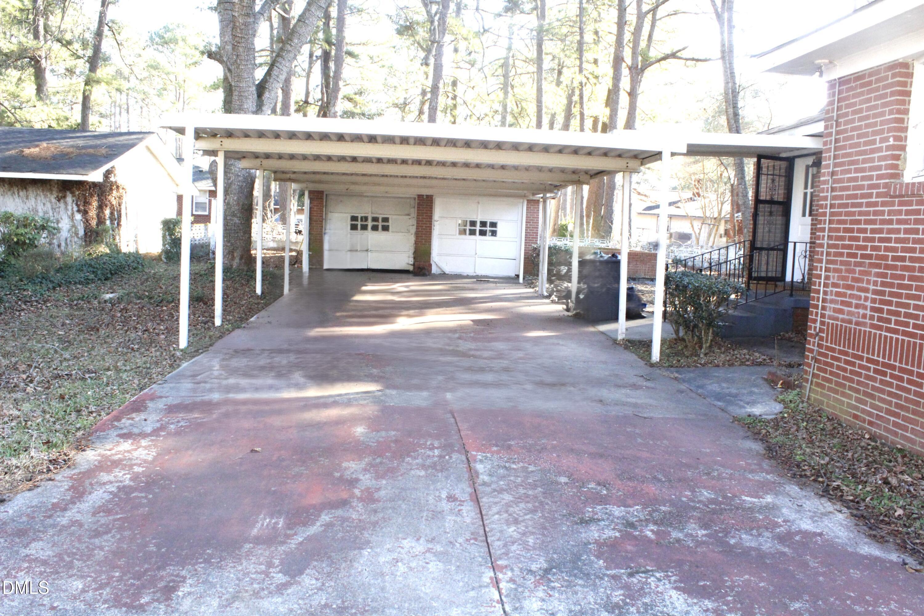 907 Leggett Road Rocky Mount, NC 27801 - Photo 23 of 23 a view of a house with a outdoor space