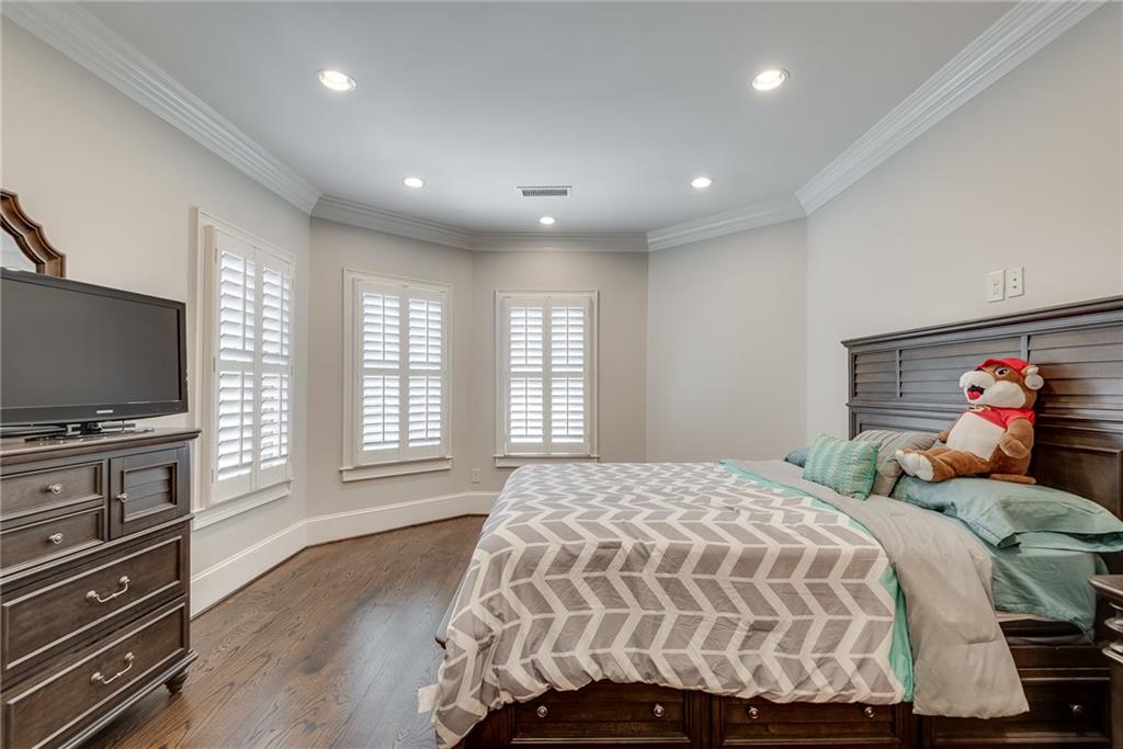 187 Fontaine Road Southwest Mableton, GA 30126 - Photo 48 of 84 a bedroom with a bed and a flat screen television