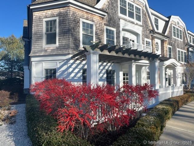 103 Main Street, Unit 2202 Stonington, CT 06378 - Photo 17 of 29 a front view of a multi story residential apartment building