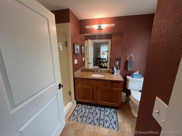103 Main Street, Unit 2202 Stonington, CT 06378 - Photo 23 of 29 a bathroom with a sink and a mirror