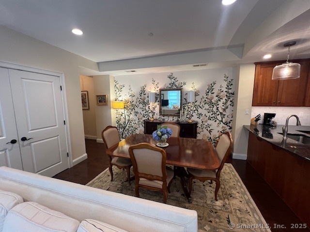 103 Main Street, Unit 2202 Stonington, CT 06378 - Photo 8 of 29 a view of a dining room with furniture