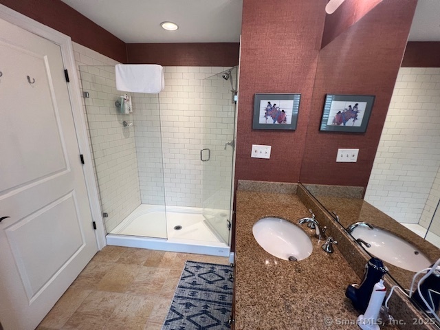103 Main Street, Unit 2202 Stonington, CT 06378 - Photo 10 of 29 a bathroom with a sink and a mirror
