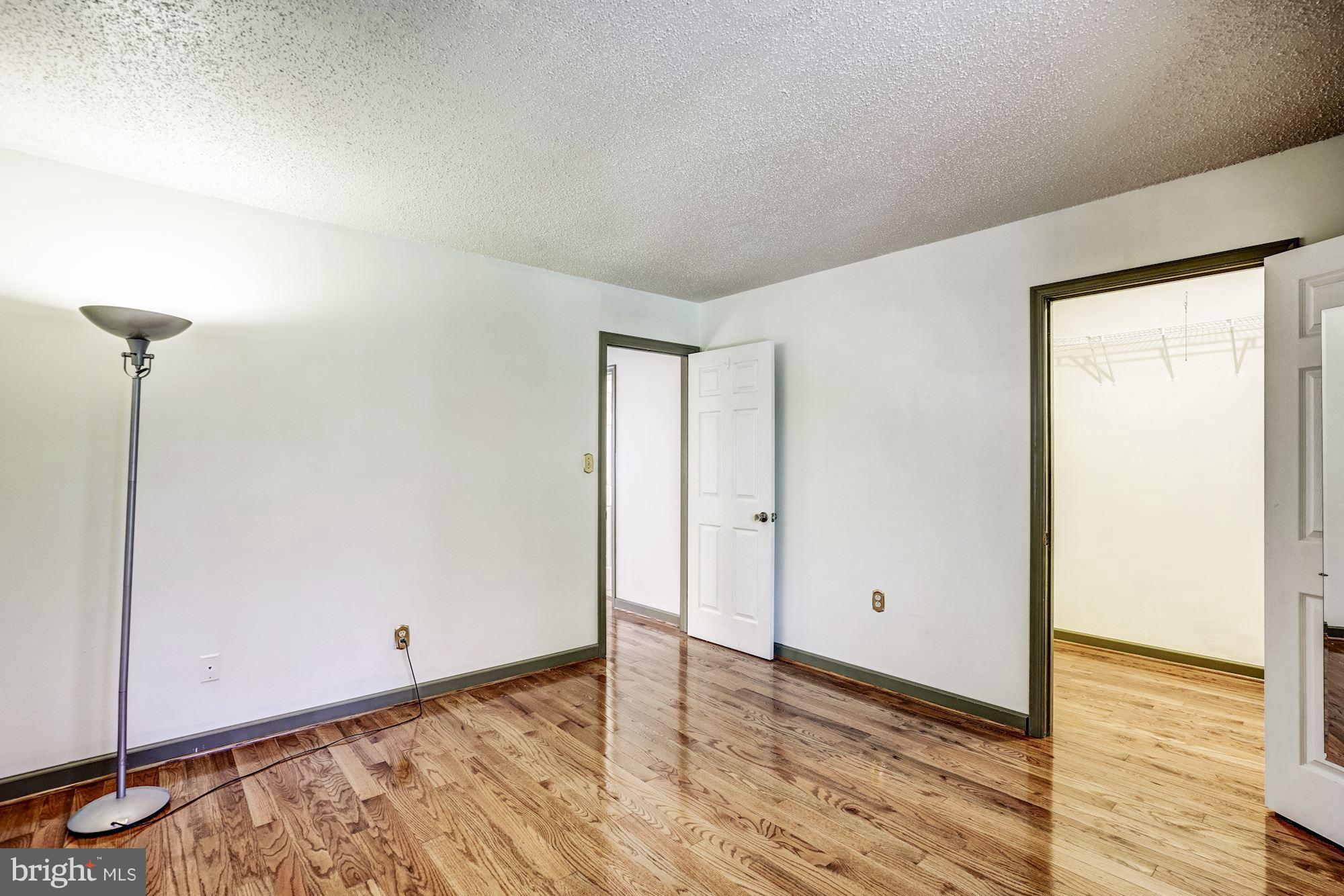 2254 Coppersmith Square Reston, VA 20191 - Photo 12 of 25 Hardwood Floors in all Bedrooms