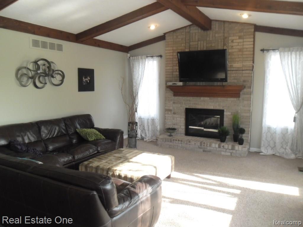1419 Chevy Circuit Rochester, MI 48306 - Photo 38 of 49 Family Room cathedral with fireplace.