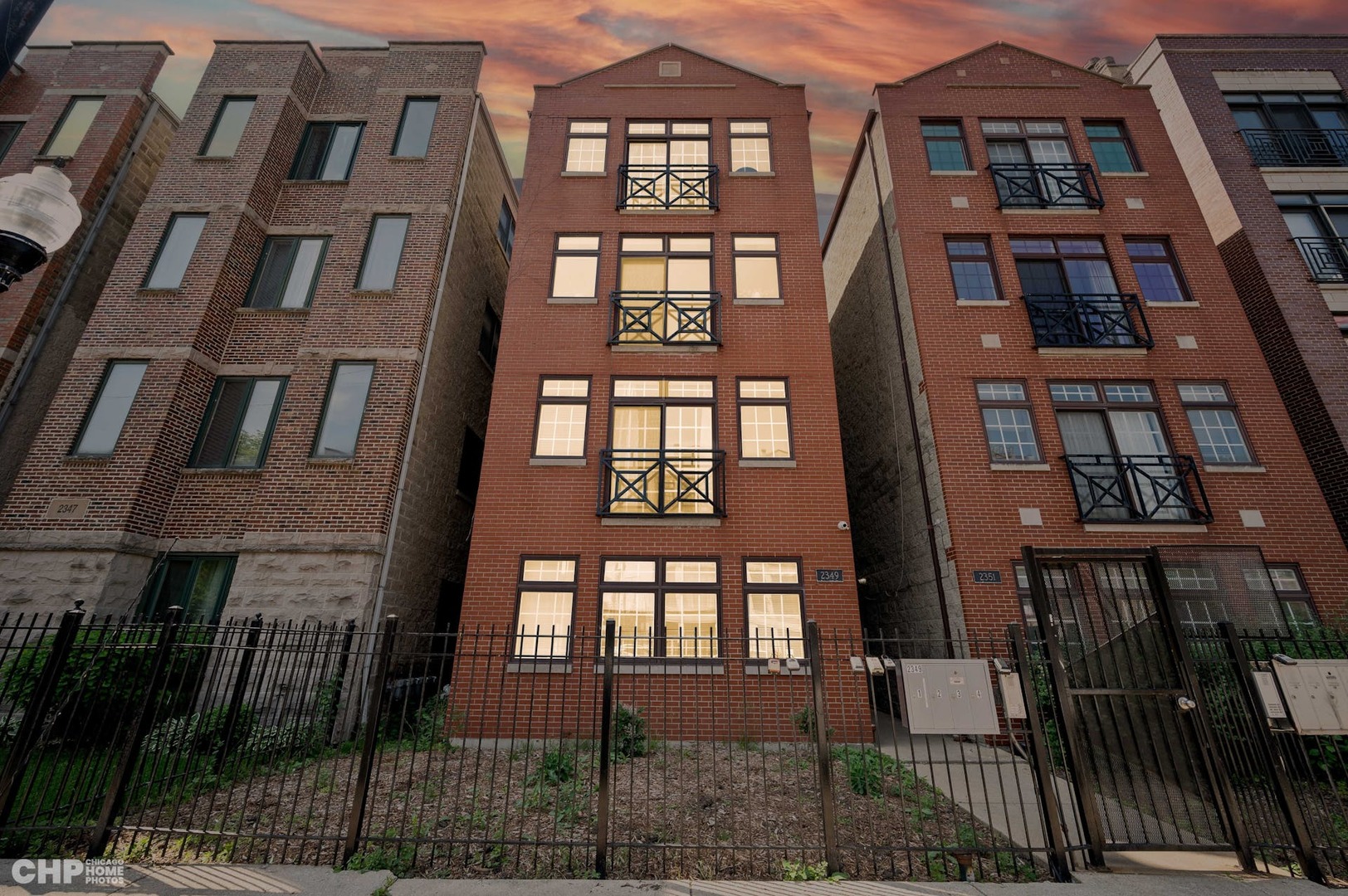 2349 West Harrison Street, Unit 3 Chicago, IL 60612 - Photo 1 of 26 front view of a brick building