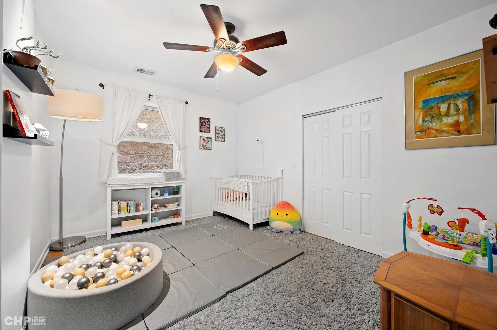 2349 West Harrison Street, Unit 3 Chicago, IL 60612 - Photo 20 of 26 a living room with furniture and a table