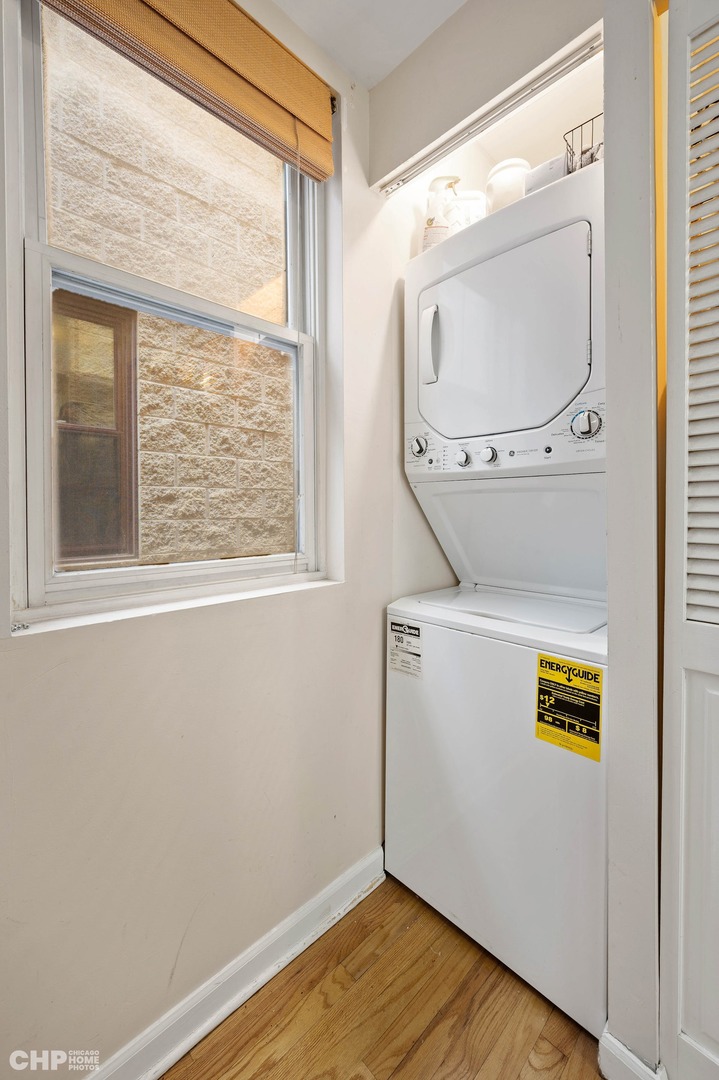 2349 West Harrison Street, Unit 3 Chicago, IL 60612 - Photo 22 of 26 a view of a small space with wooden floor and cabinet