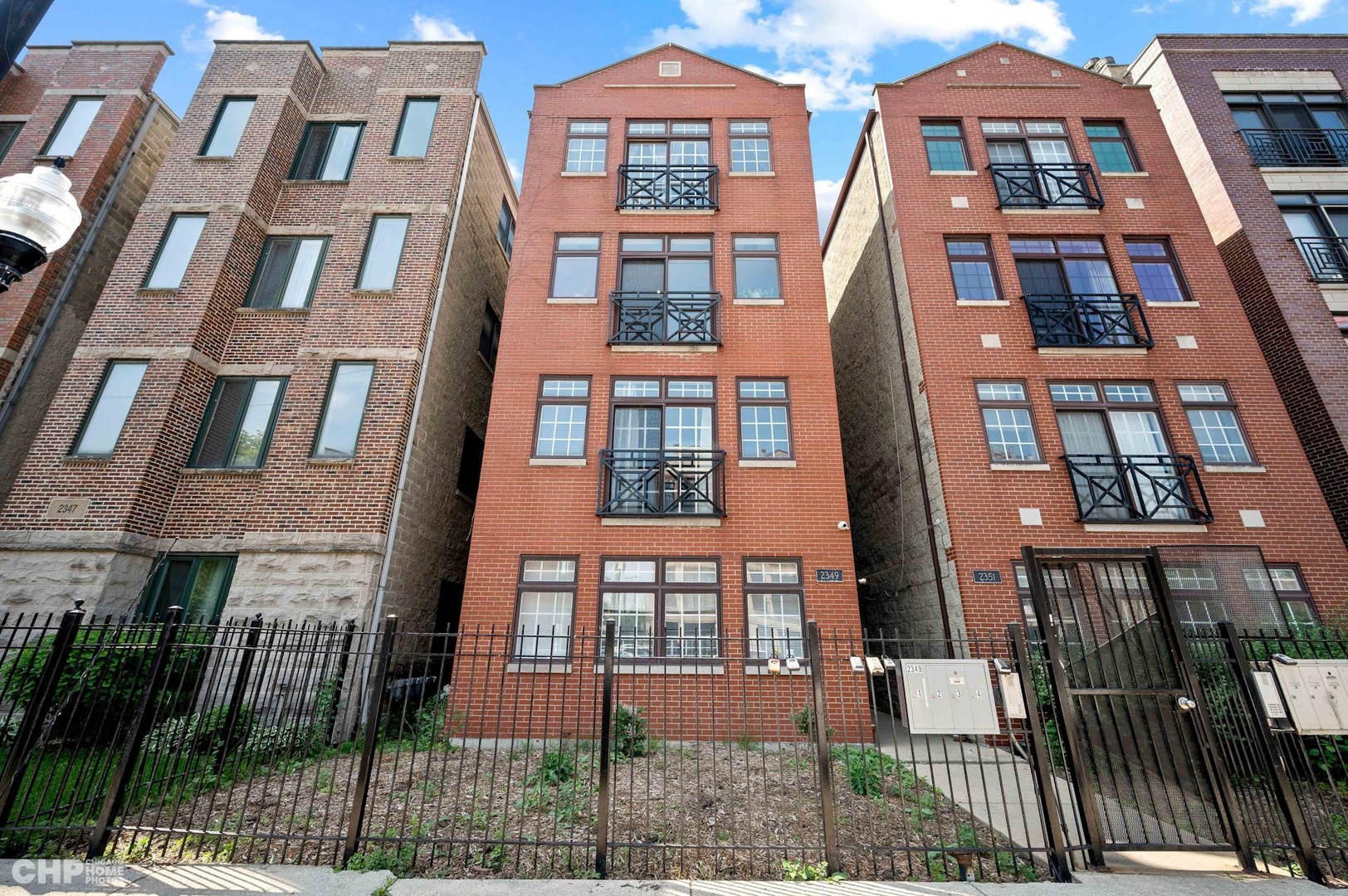 2349 West Harrison Street, Unit 3 Chicago, IL 60612 - Photo 25 of 26 front view of a brick building
