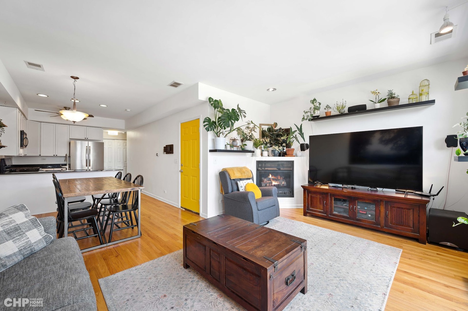 2349 West Harrison Street, Unit 3 Chicago, IL 60612 - Photo 6 of 26 a living room with furniture and a flat screen tv