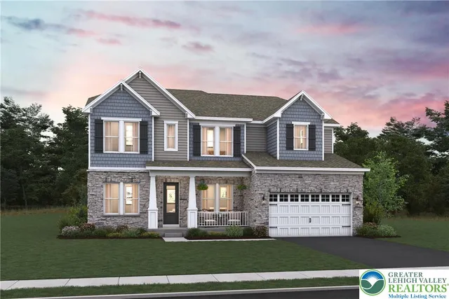 a view of a house with a yard and large trees