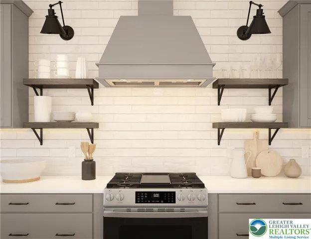 a kitchen with a stove and a sink