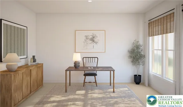 a workspace with furniture and window