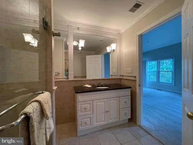 a bathroom with a toilet and a bathtub