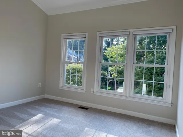 a view of a house with swimming pool and yard