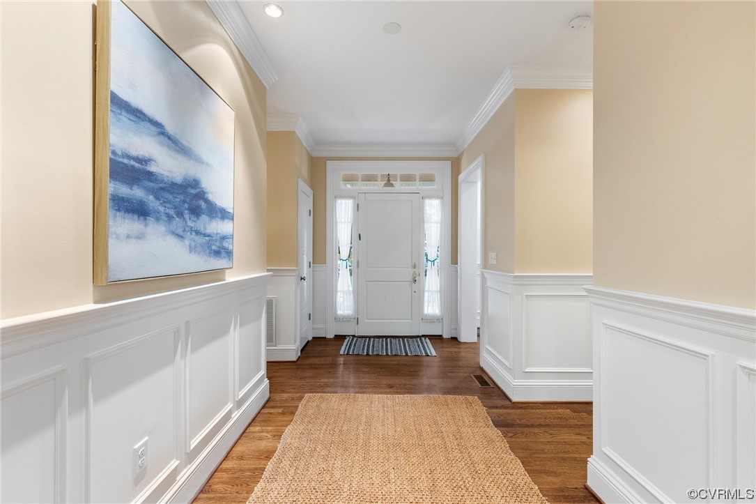 105 Culpepper Road Henrico, VA 23229 - Photo 3 of 40 a view of a hallway with wooden floor and a bathroom