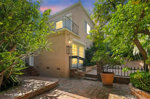a aerial view of a house with a yard