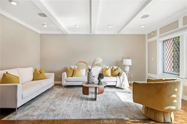 a living room with furniture and a couch