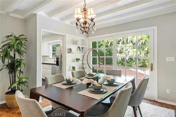 a view of a dining room with furniture window and outside view