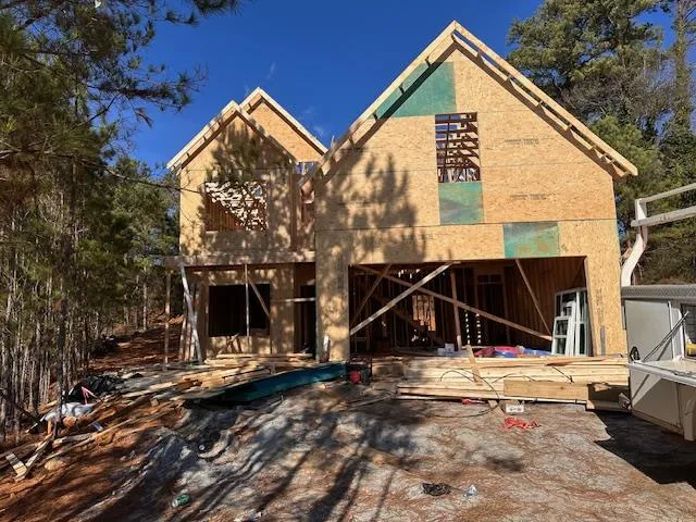 a view of house with a flat screen tv