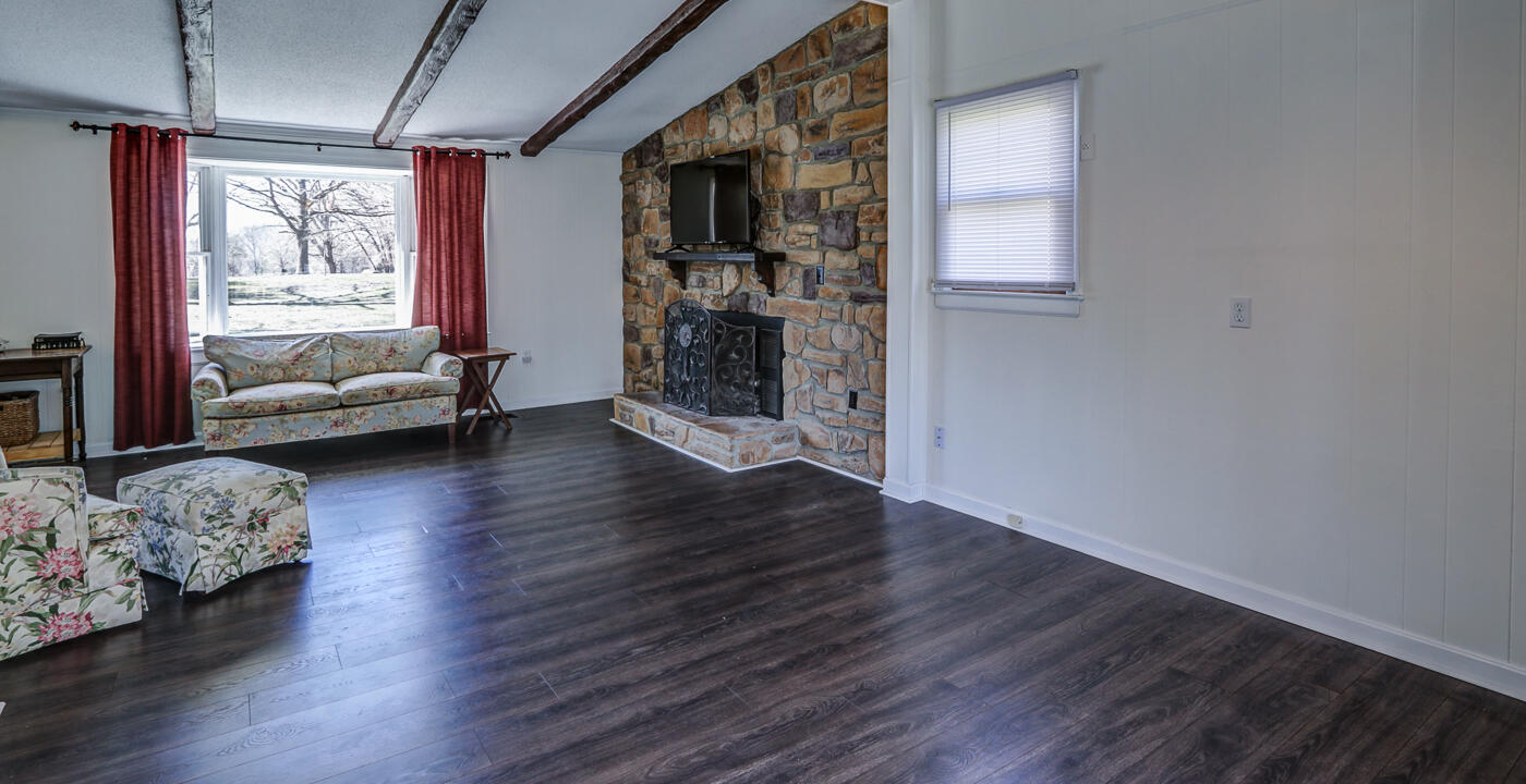 1306 Gills Road Bedford, VA 24523 - Photo 11 of 65 a living room with furniture and wooden floor