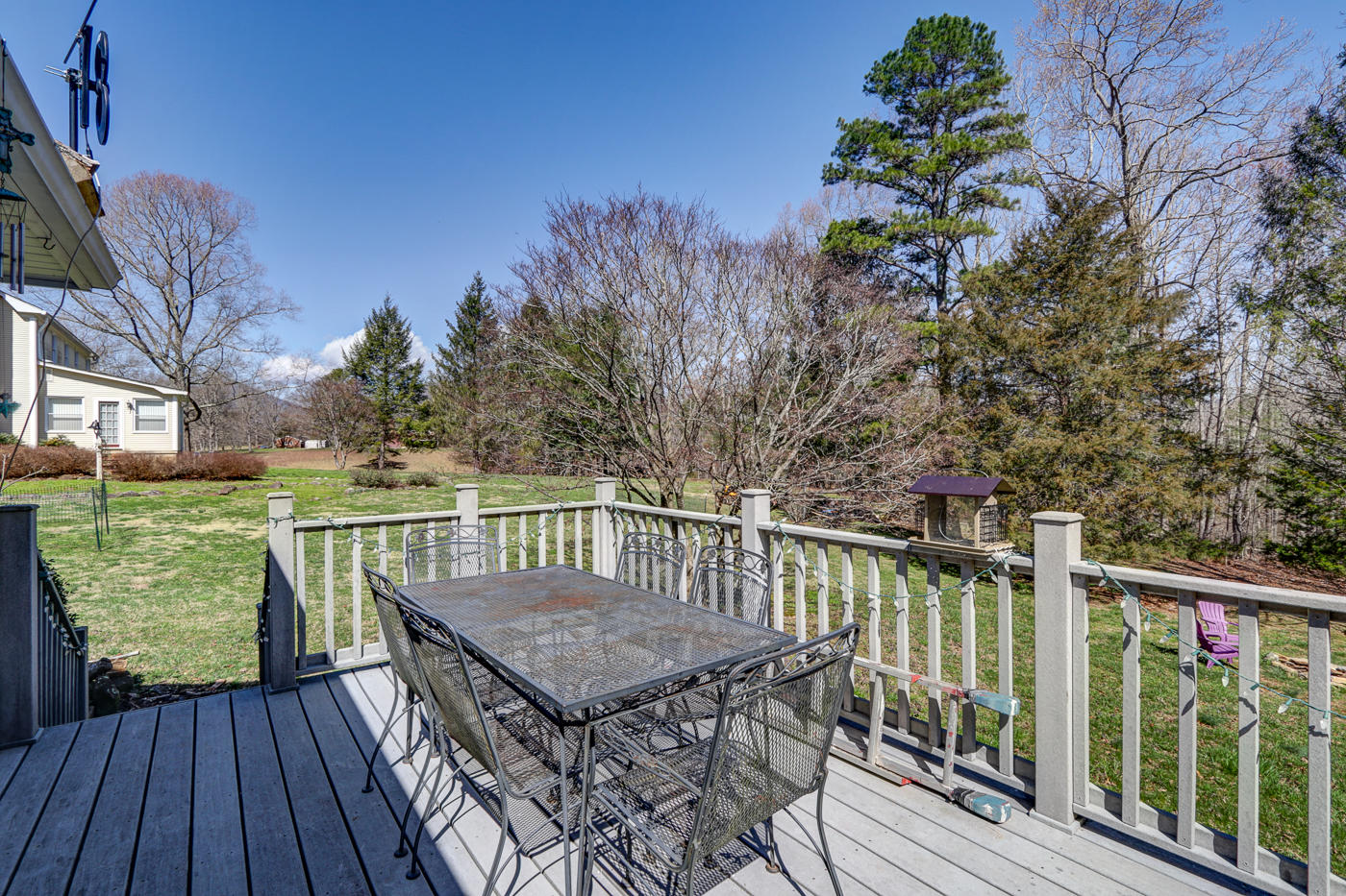 1306 Gills Road Bedford, VA 24523 - Photo 16 of 65 a view of a balcony with wooden floor and fence