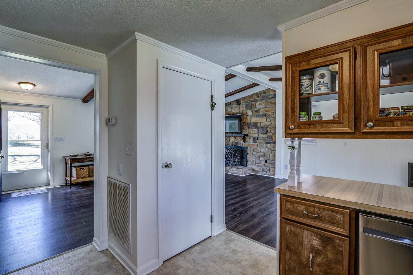 1306 Gills Road Bedford, VA 24523 - Photo 25 of 65 a kitchen view of a refrigerator and wooden floor