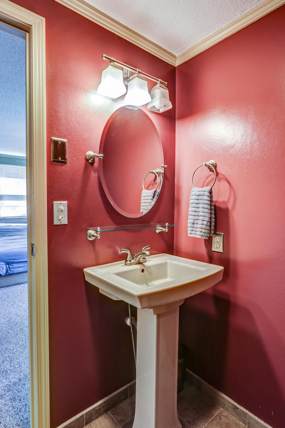 1306 Gills Road Bedford, VA 24523 - Photo 36 of 65 a bathroom with a sink and a mirror