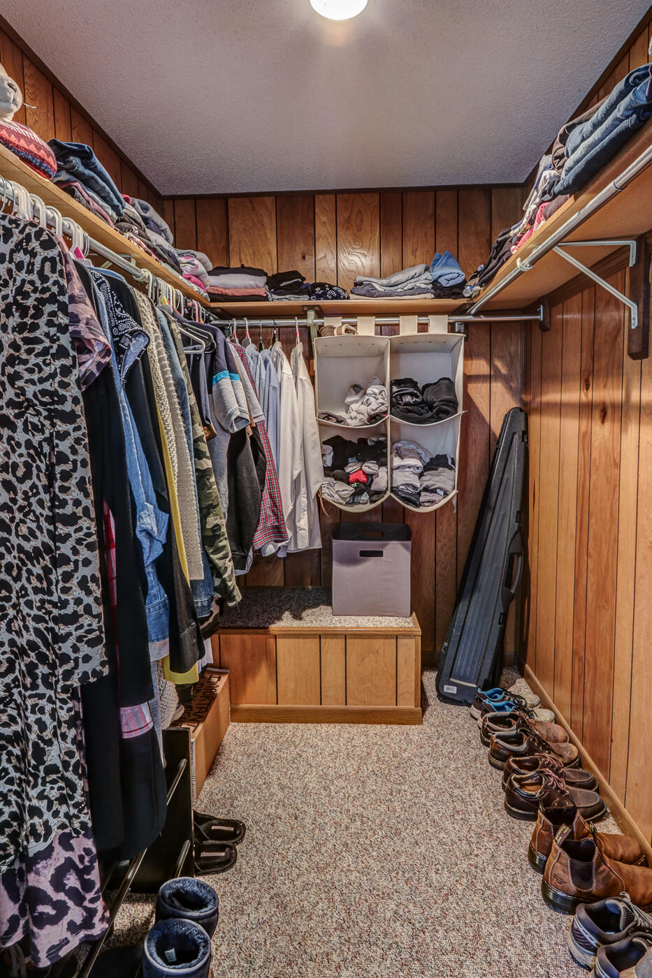 1306 Gills Road Bedford, VA 24523 - Photo 37 of 65 a view of walk in closet with clothes and shoes