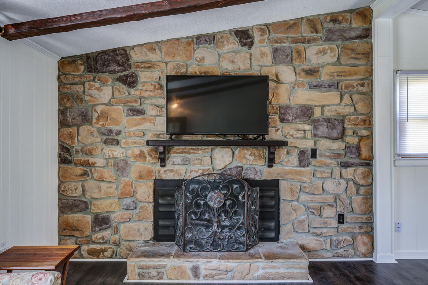 1306 Gills Road Bedford, VA 24523 - Photo 5 of 65 a living room with fireplace and a flat screen tv
