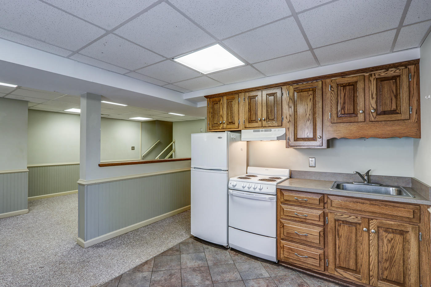 1306 Gills Road Bedford, VA 24523 - Photo 41 of 65 a kitchen with cabinets appliances a sink and a counter top space