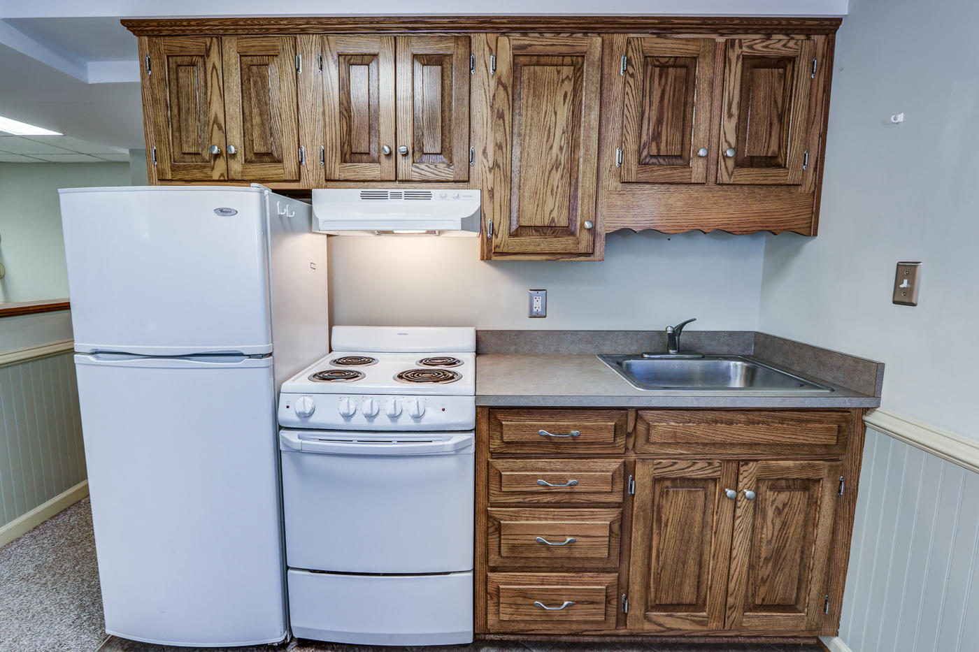 1306 Gills Road Bedford, VA 24523 - Photo 42 of 65 a kitchen with appliances a refrigerator and cabinets