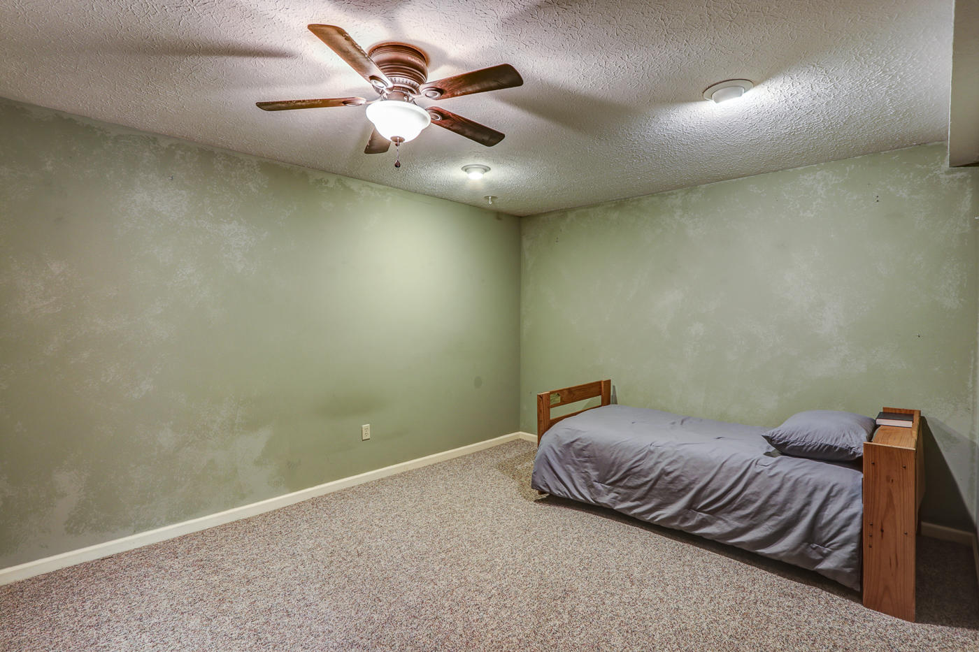 1306 Gills Road Bedford, VA 24523 - Photo 47 of 65 a bedroom with a bed and a ceiling fan