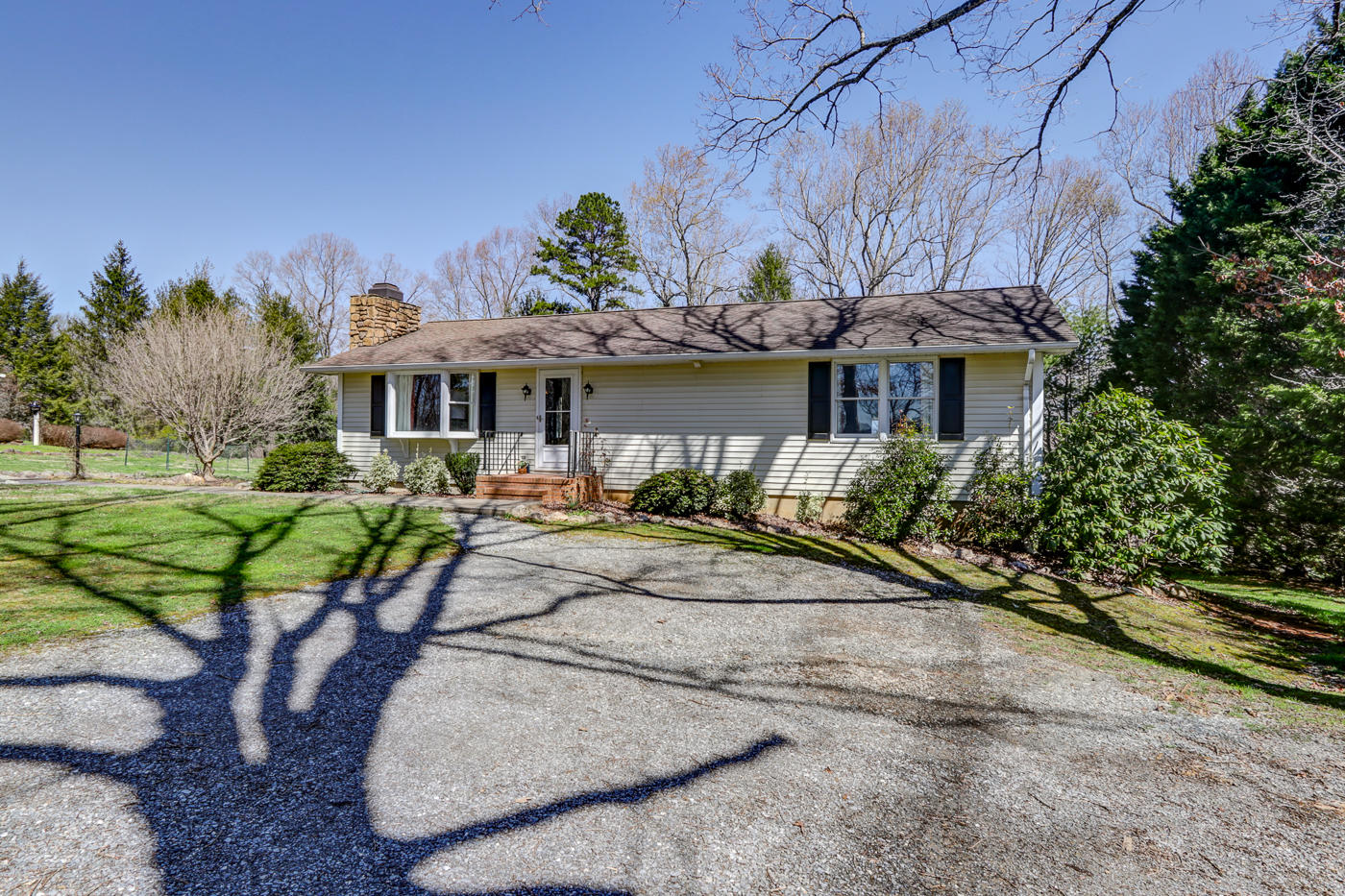 1306 Gills Road Bedford, VA 24523 - Photo 55 of 65 a view of a house with backyard and sitting area