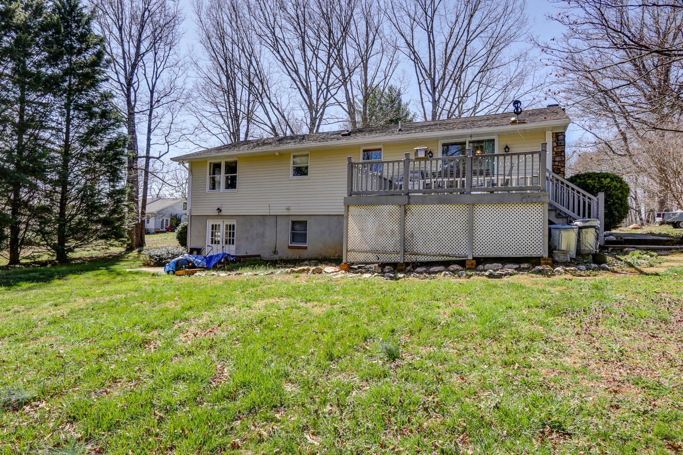 1306 Gills Road Bedford, VA 24523 - Photo 62 of 65 a view of a house with backyard and trees