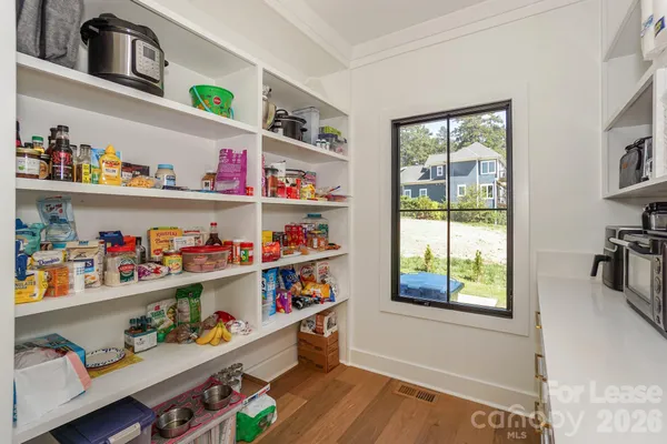 a room with lots of different kinds of food