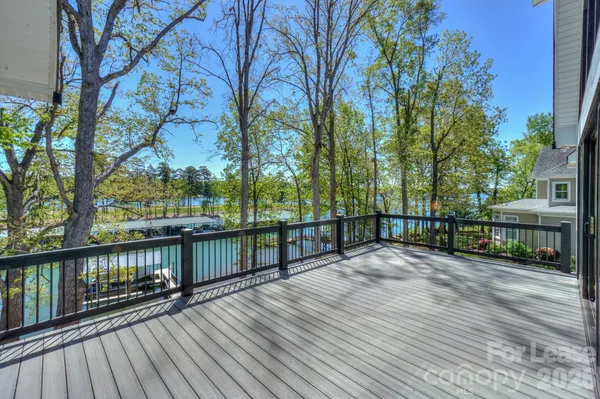 a view of a deck with trees