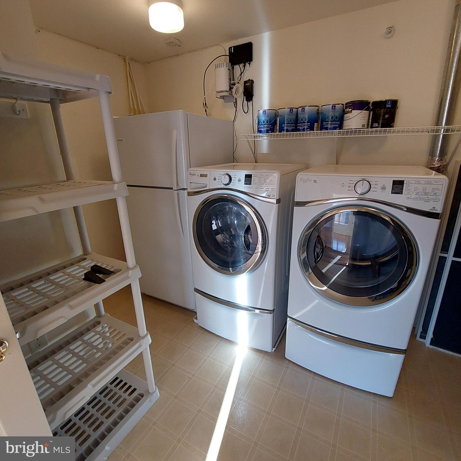 12251 Roundwood Road, Unit 807 Lutherville-Timonium, MD 21093 - Photo 18 of 23 Laundry/utility room with extra refrig/freezer