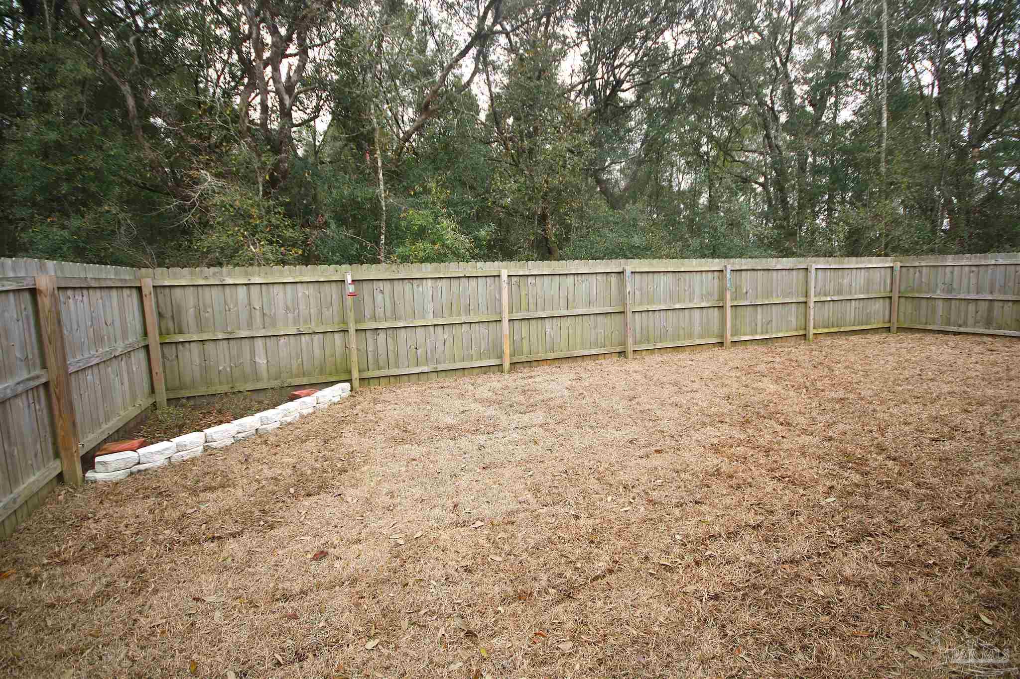 3849 Ranch Road Pace, FL 32571 - Photo 54 of 56 a view of a backyard