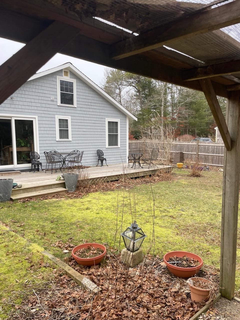 76 Camp Opechee Road Centerville, MA 02632 - Photo 25 of 37 a view of a swimming pool with a patio