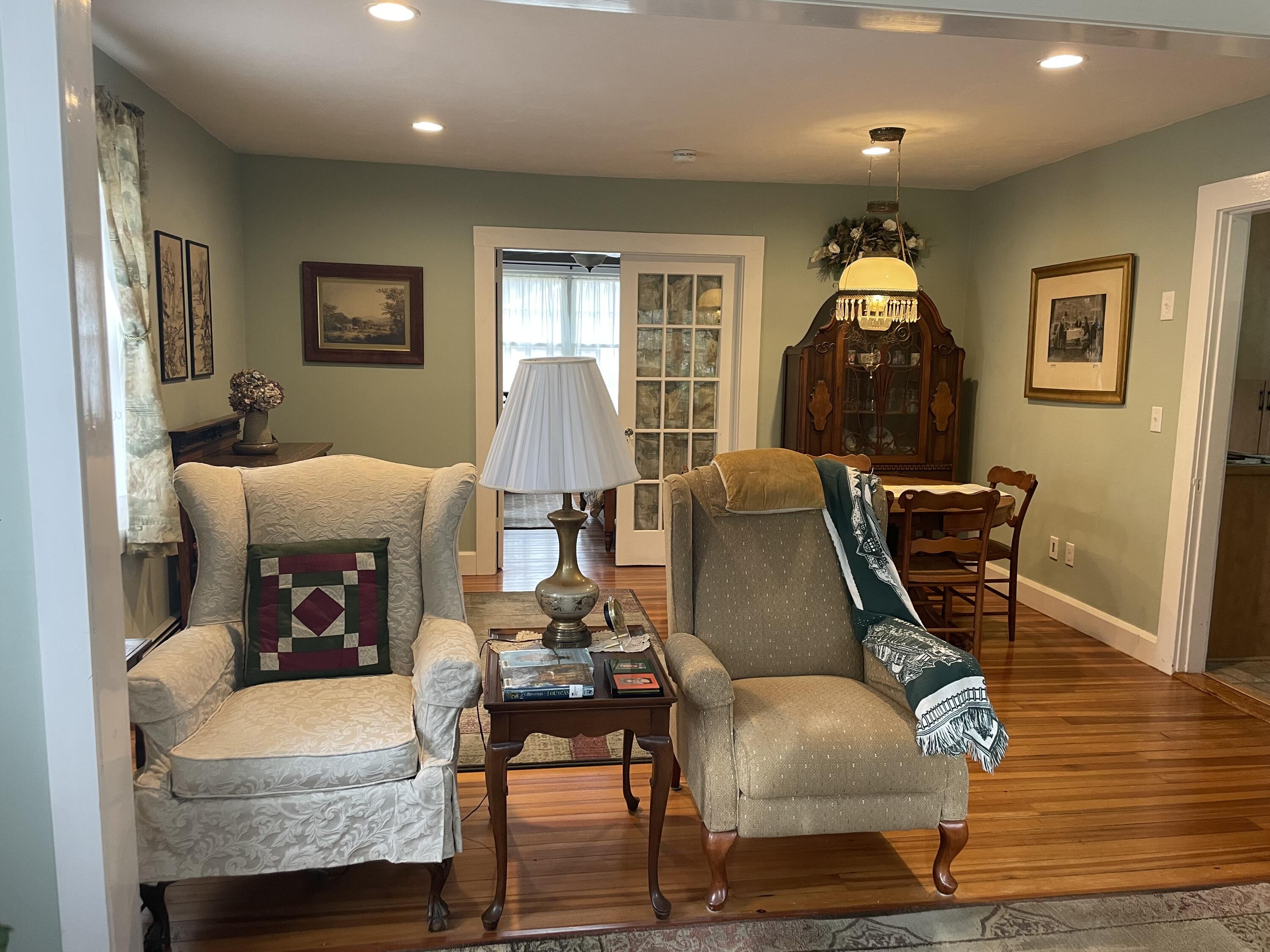 76 Camp Opechee Road Centerville, MA 02632 - Photo 3 of 37 a living room with furniture and a window