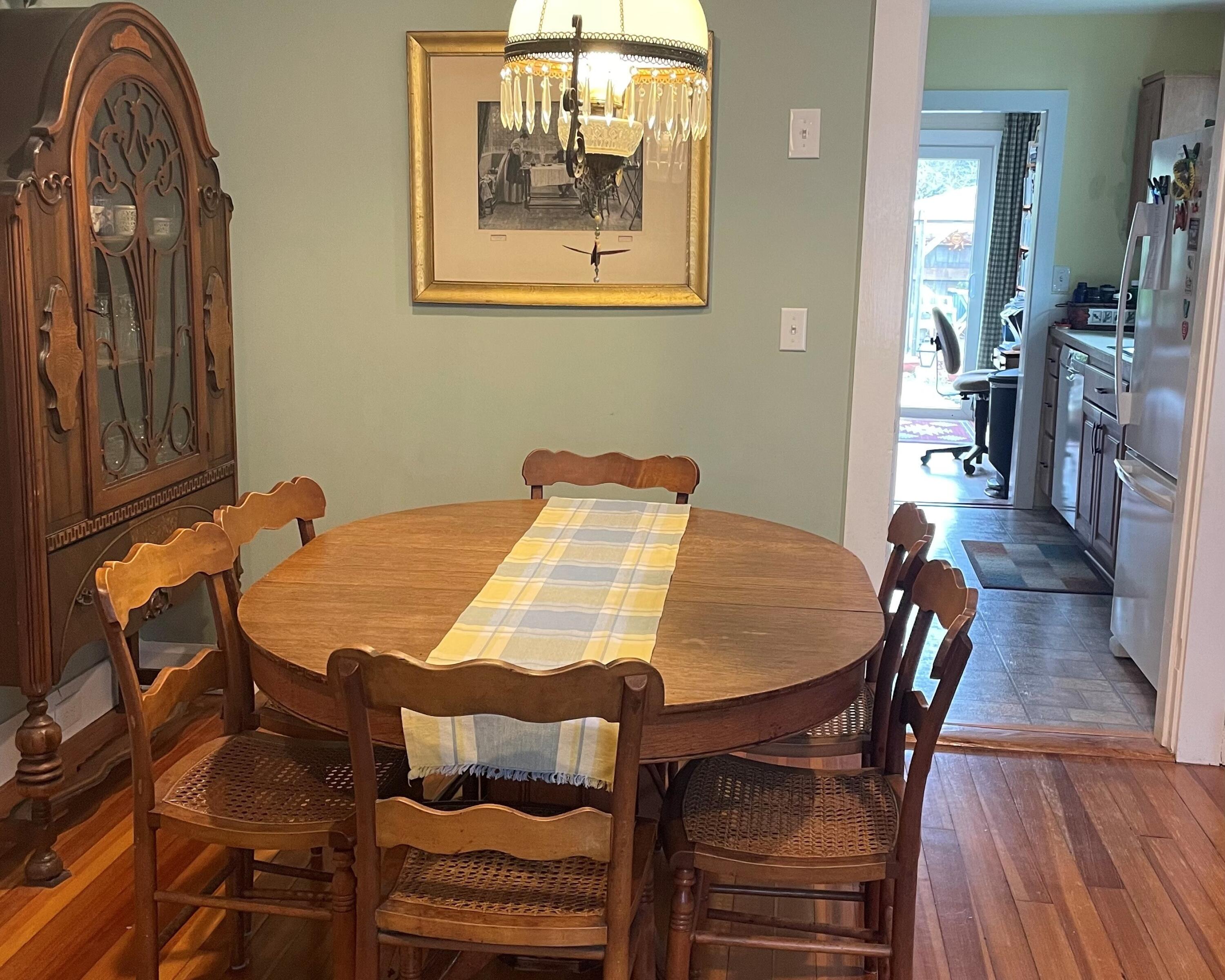 76 Camp Opechee Road Centerville, MA 02632 - Photo 4 of 37 a dining room with furniture and wooden floor