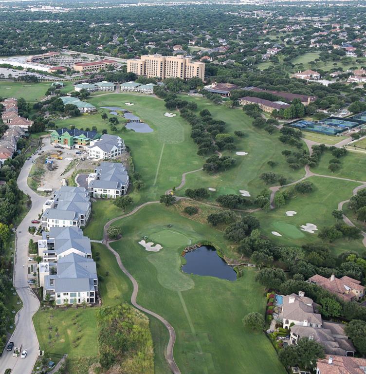 350 North O Connor Ridge Boulevard, Unit 24 Irving, TX 75038 - Photo 1 of 1 an aerial view of residential houses with outdoor space and trees