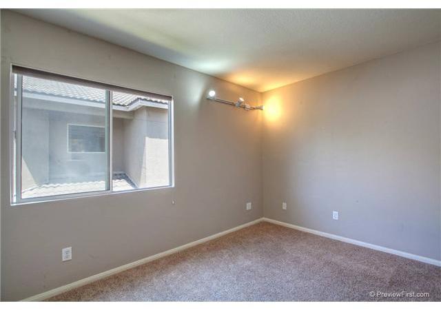 1263 Mill Valley Road Chula Vista, CA 91913 - Photo 14 of 20 Bedroom #2 is bright room with a nice size window and jack & jill bathroom shared with bedroom #3. This bedroom measures 12'x10'