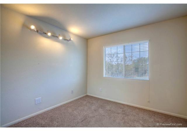 1263 Mill Valley Road Chula Vista, CA 91913 - Photo 16 of 20 Bedroom #3 faces west and enjoys the afternoon sunshine. This room measures 10'x10'