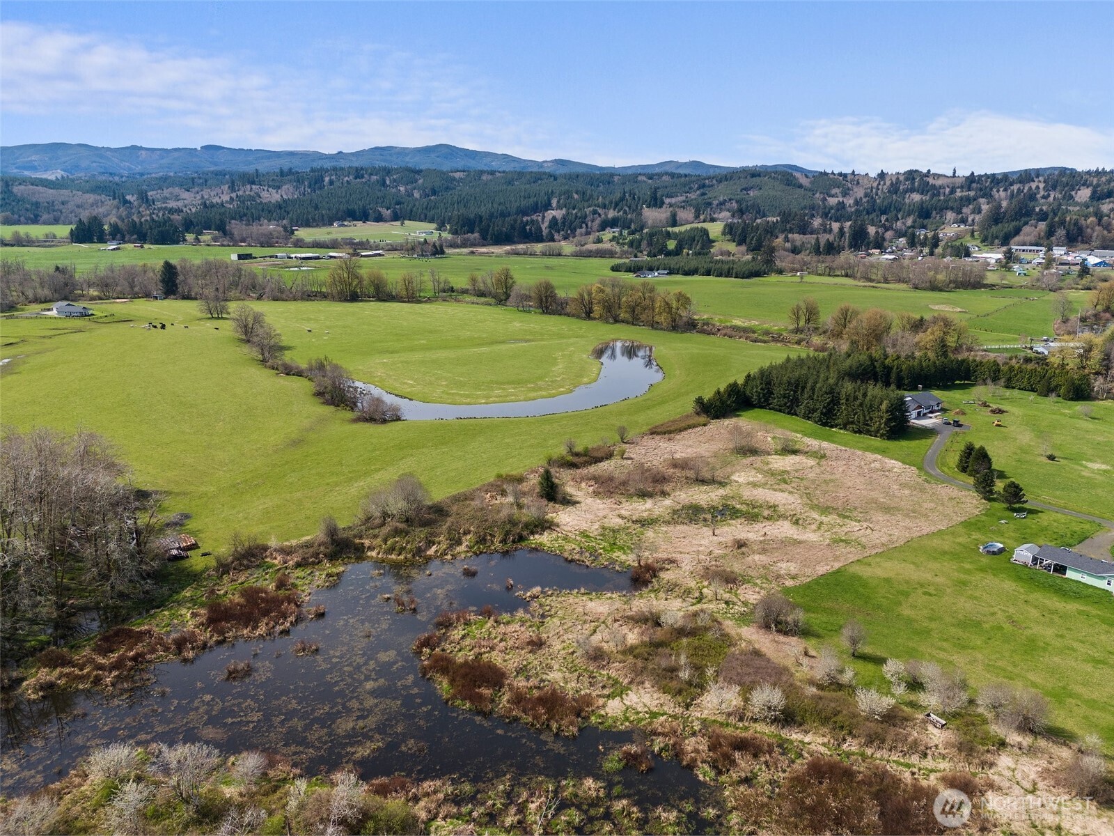 0 X Lilly Wheaton Road Raymond, WA 98577 - Photo 7 of 14 a view of a lake with a city