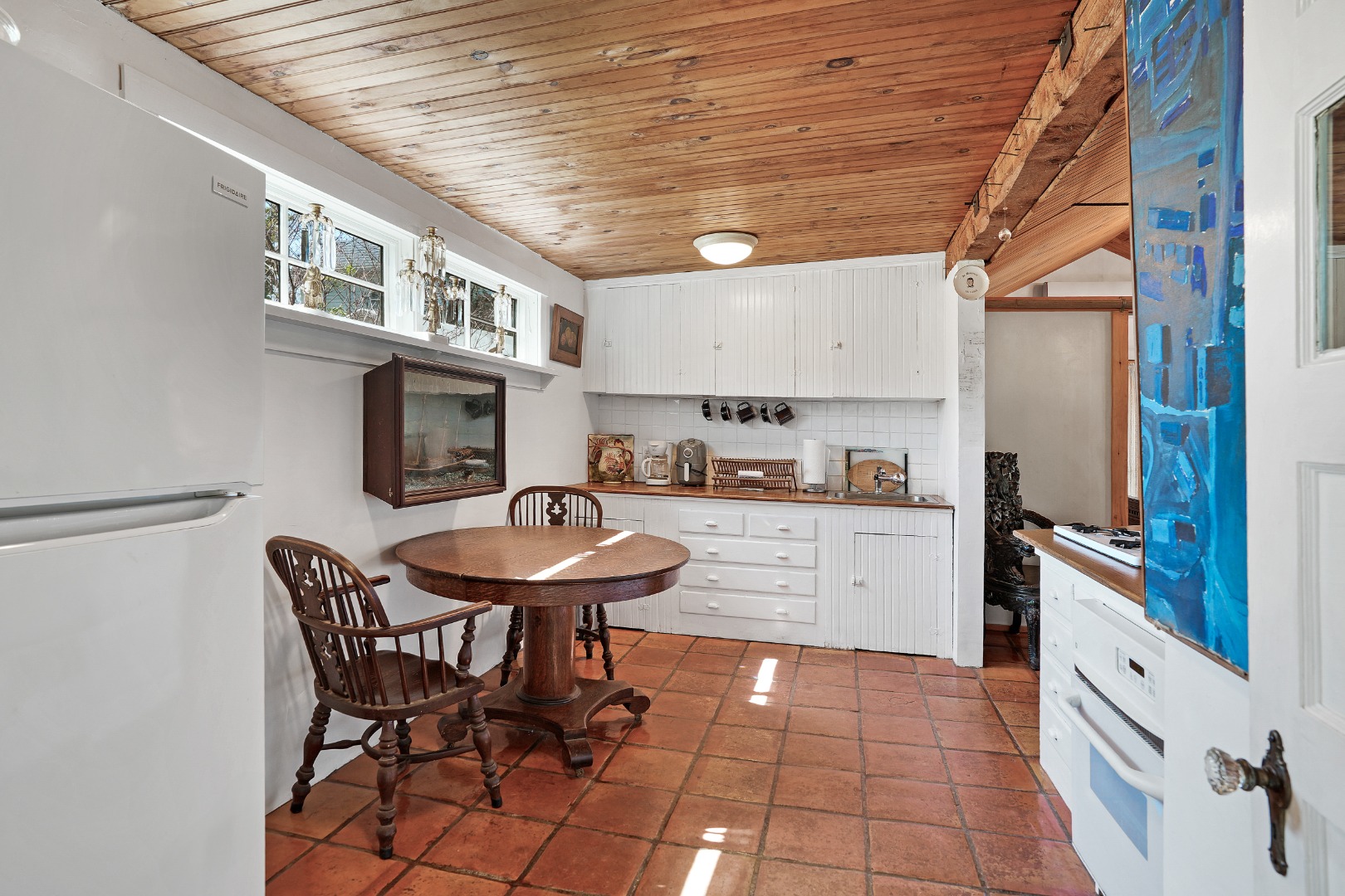 12 Maple Avenue Oak Bluffs, MA 02557 - Photo 16 of 55 a kitchen with stainless steel appliances granite countertop a sink and cabinets
