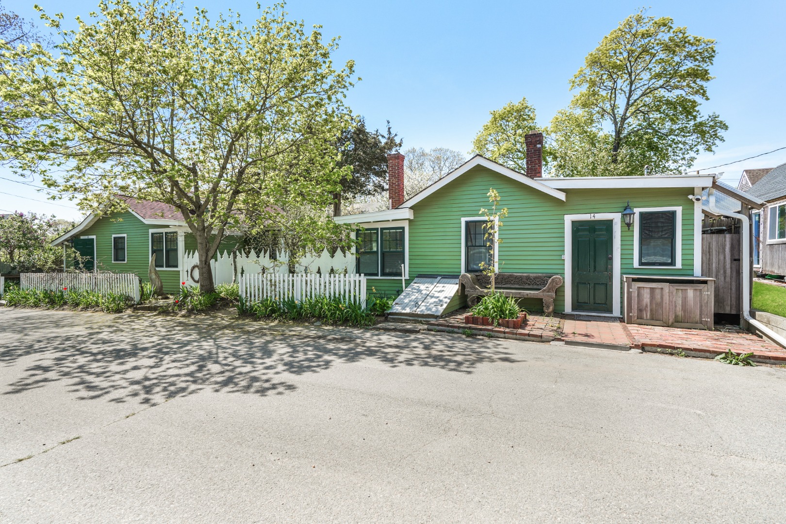 12 Maple Avenue Oak Bluffs, MA 02557 - Photo 2 of 55 a view of a house with a patio and a yard