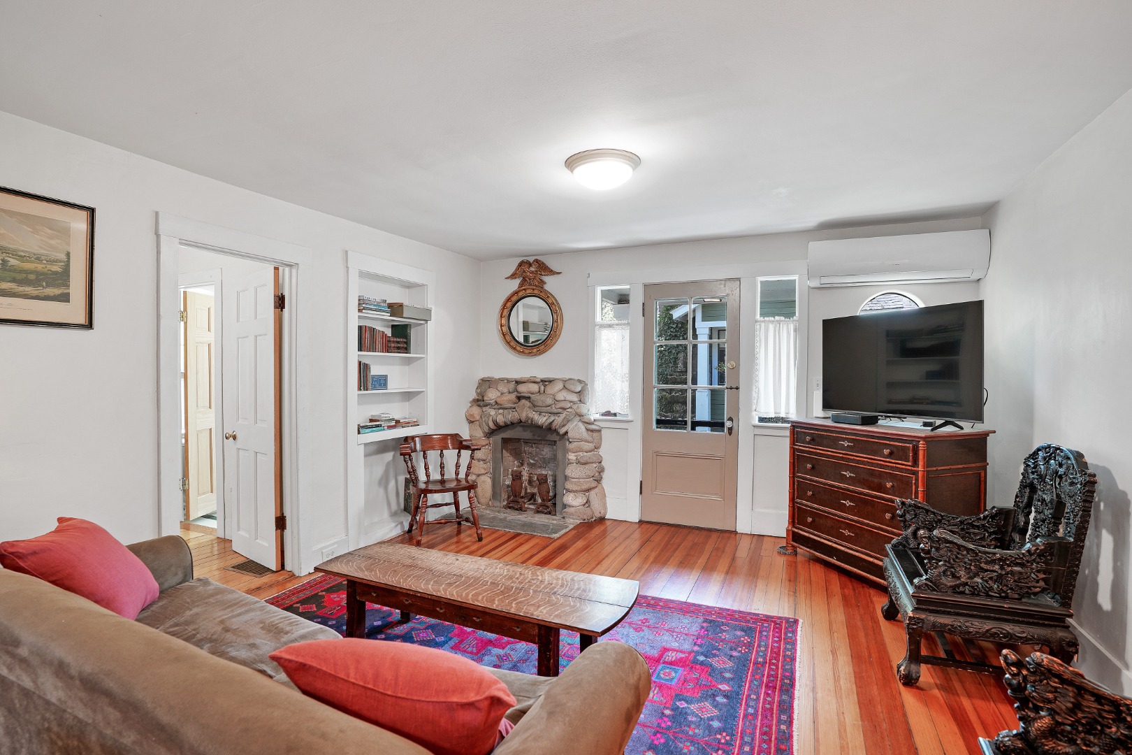 12 Maple Avenue Oak Bluffs, MA 02557 - Photo 39 of 55 a living room with furniture and a flat screen tv