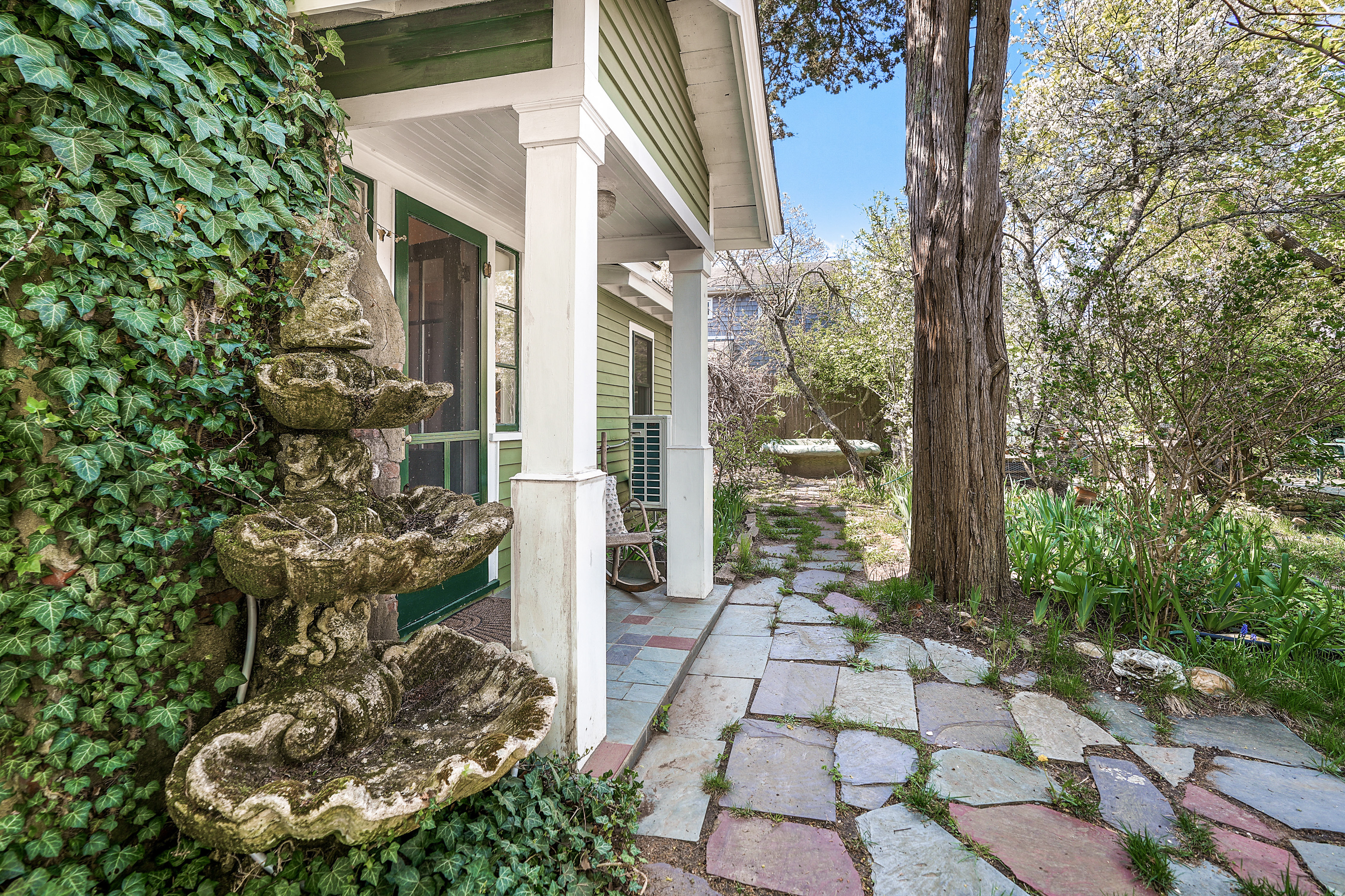 12 Maple Avenue Oak Bluffs, MA 02557 - Photo 7 of 55 a view of a house with a yard and garden