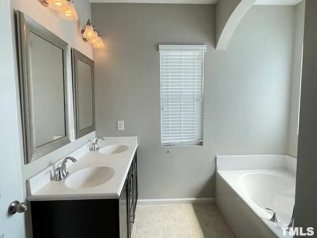 a bathroom with a sink and a bathtub